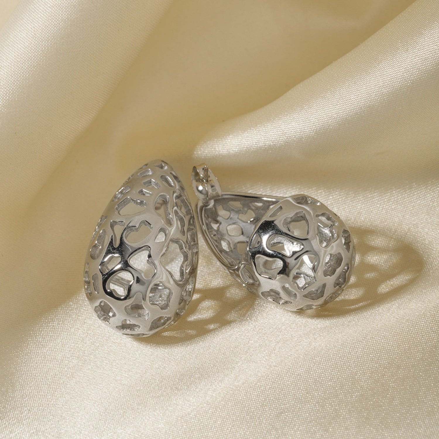 Stainless Steel Teardrop Hollowed Earrings - ClozArt