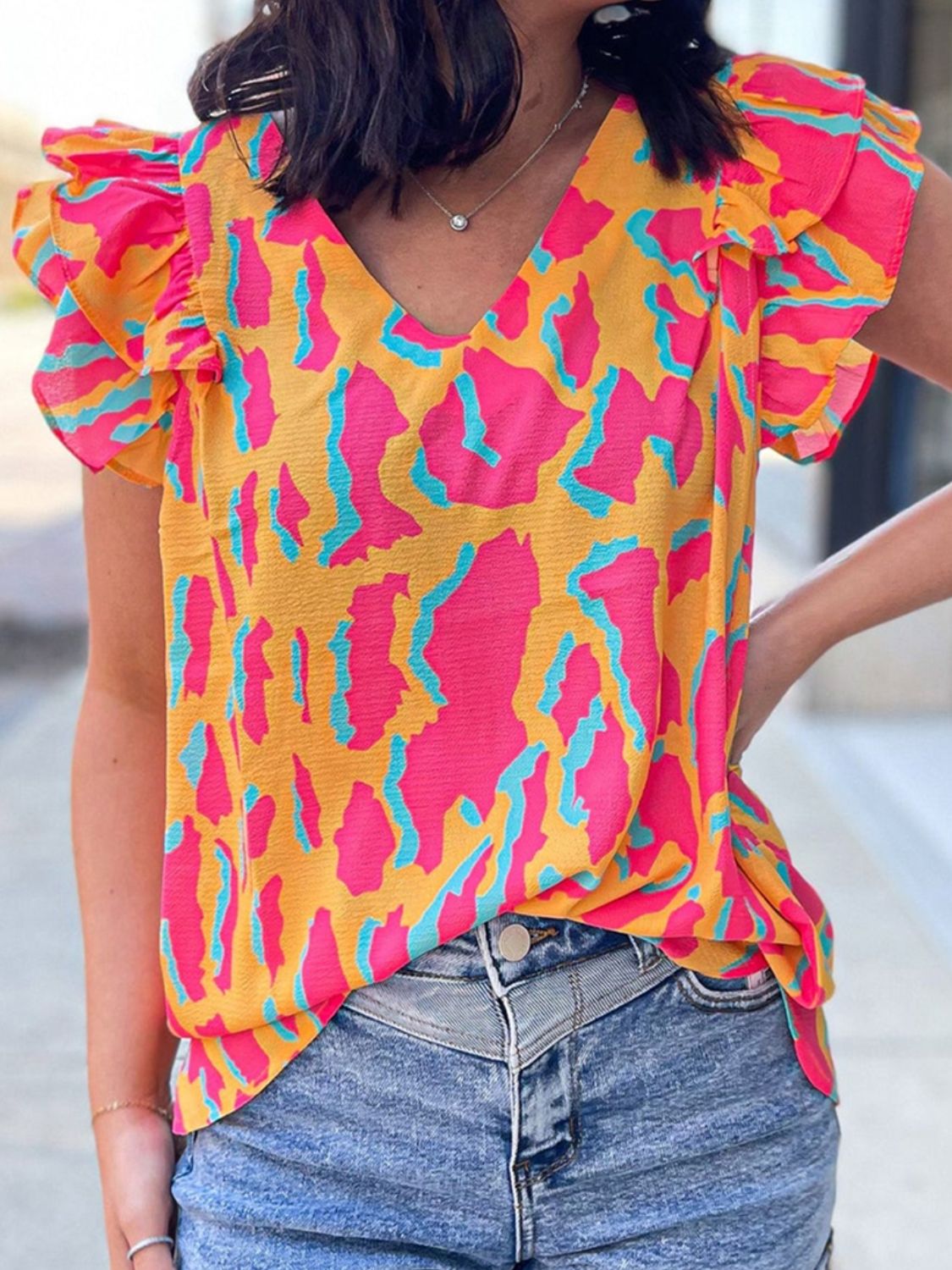 Ruffled Printed V-Neck Cap Sleeve Blouse